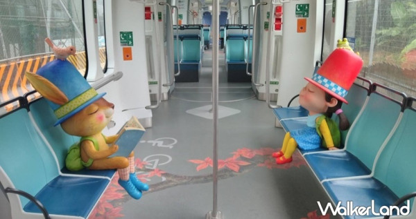 幾米主題列車來了！淡海輕軌推出3款幾米主題列車，「閉上眼睛一下下」繪本娃娃驚喜現身車廂，超萌模樣讓人捨不得下車。